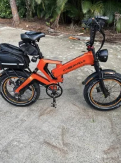 X50 with panniers near the beach